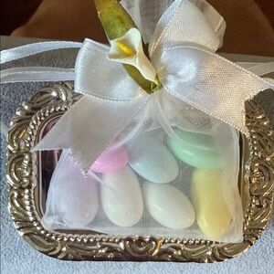 Elegant Silver and White Candy Dish with Pastel Almonds